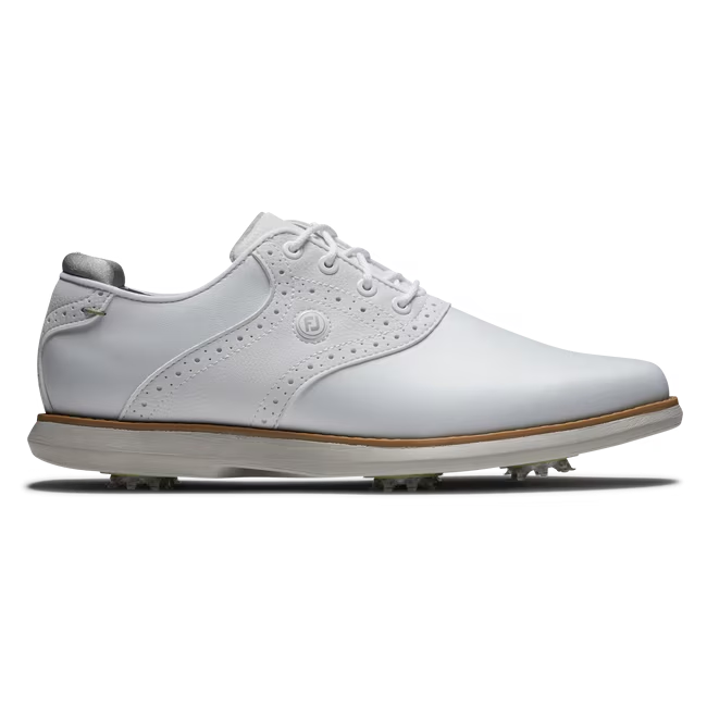 Side view of white beige golf shoe