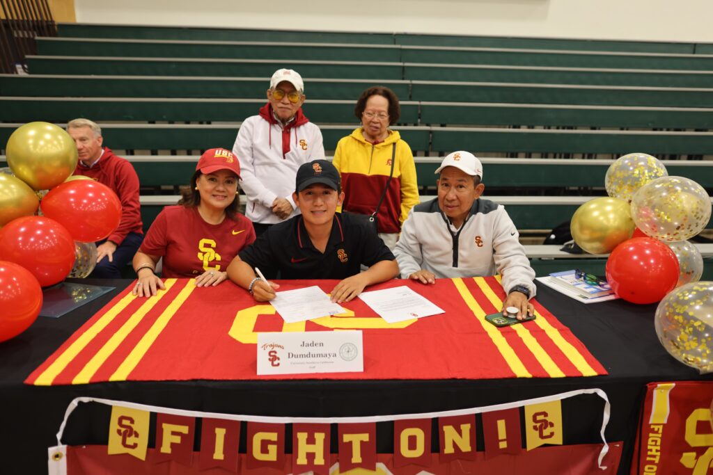 Jaden Dumdumaya signs with USC on National Signing Day.