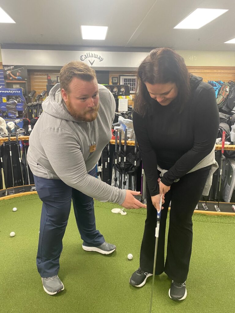 Brad Bowen helping a customer at the Haggin Oaks Golf Super Shop