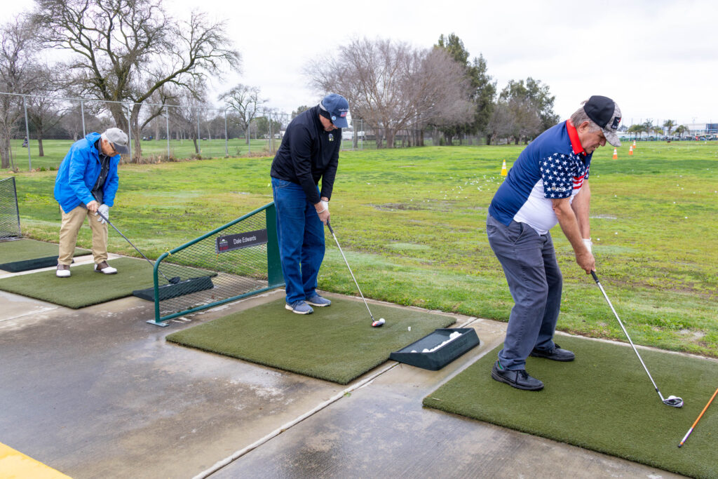Three Veterans druing a PGA Hope 2.0 lesson at the Haggin Oaks Driving Range