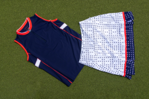 red white and blue tank top and polka dot skirt on grass background