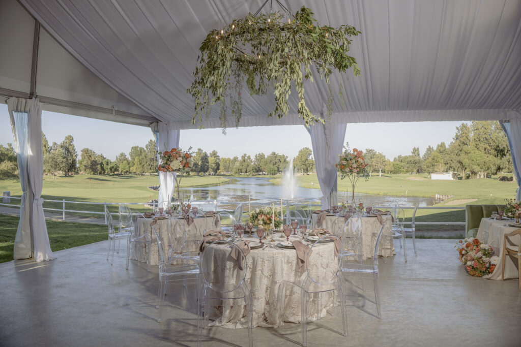 An interior shot of the tent at Bartley Cavanaugh. The lake fountain can be seen through the tent.