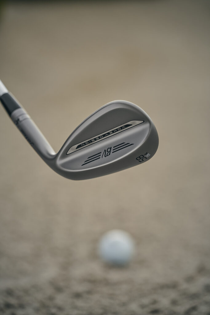 Vokey SM11 Wedges  about to hit the ball in sand 