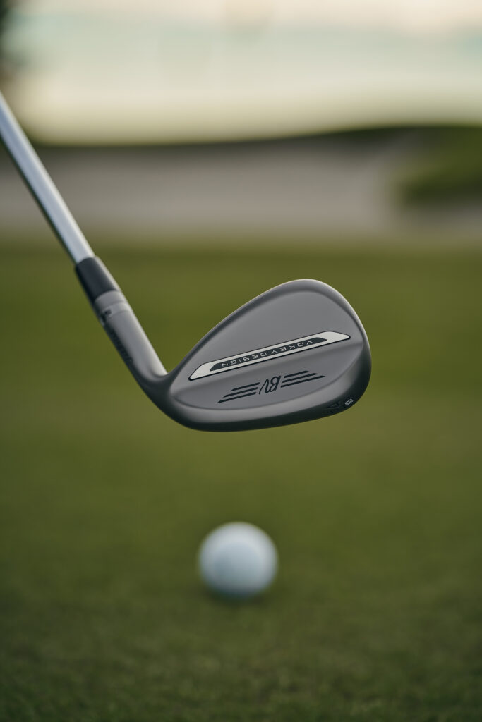 Vokey SM11 Wedges about to hit the ball 