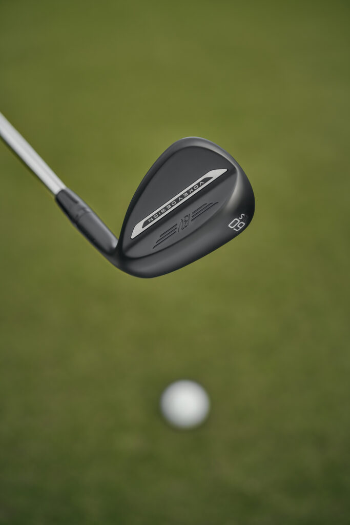 Vokey SM11 Wedges about to hit the ball 