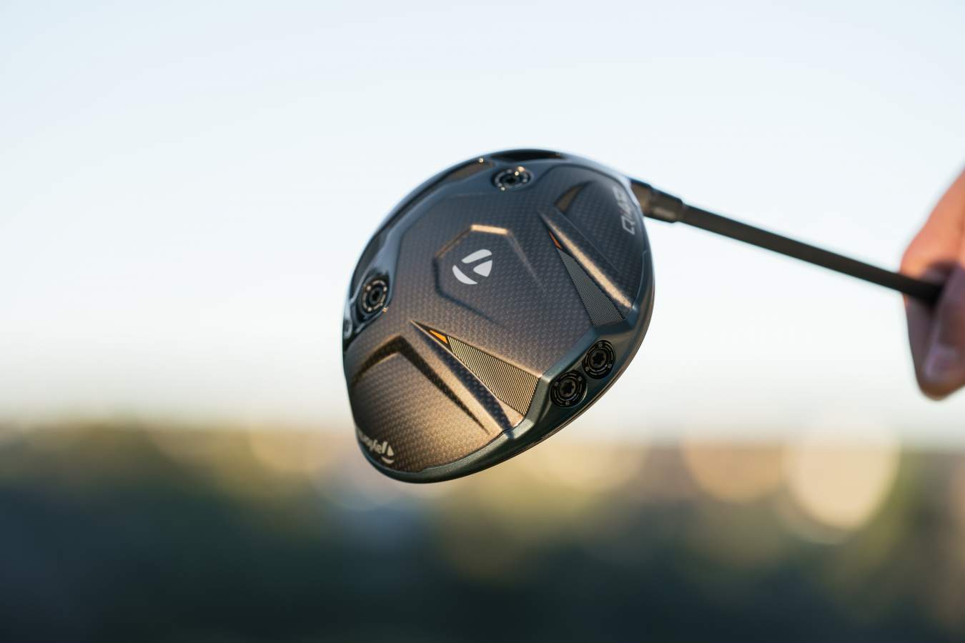A close-up of a TaylorMade Qi4D driver.