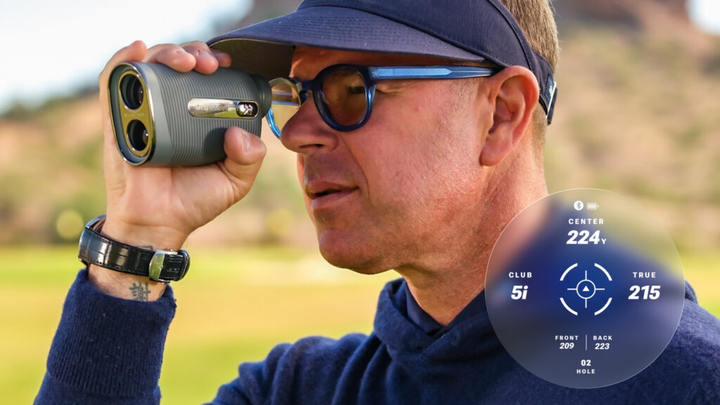 Man Holding a Blue Tee Captain Air Range finder
