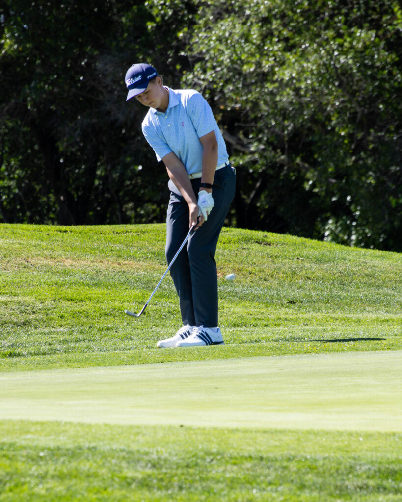 An AJGA Junior Golfer Chipping