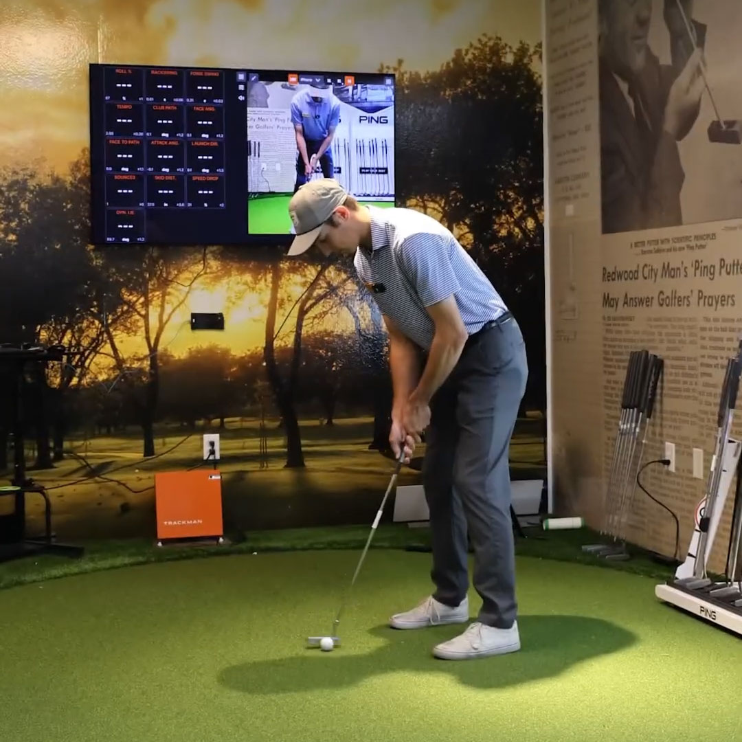 Certified golf fitter analyzing putting stroke with TrackMan technology in Sacramento