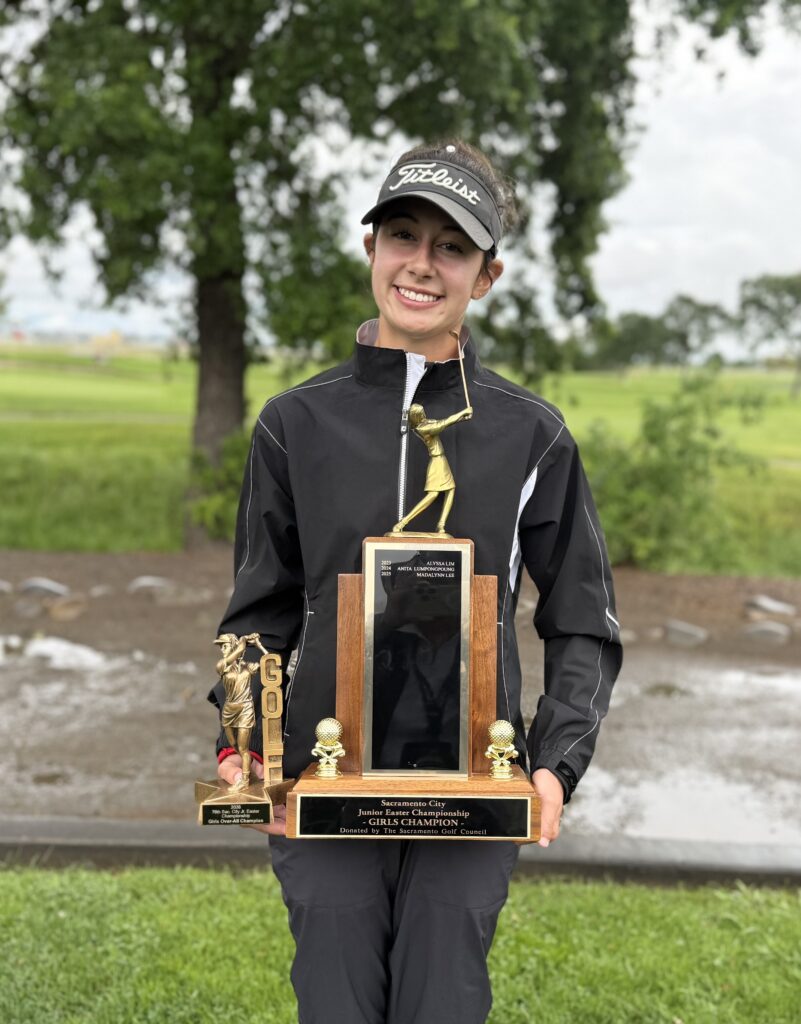 Ella Lawson with her trophies