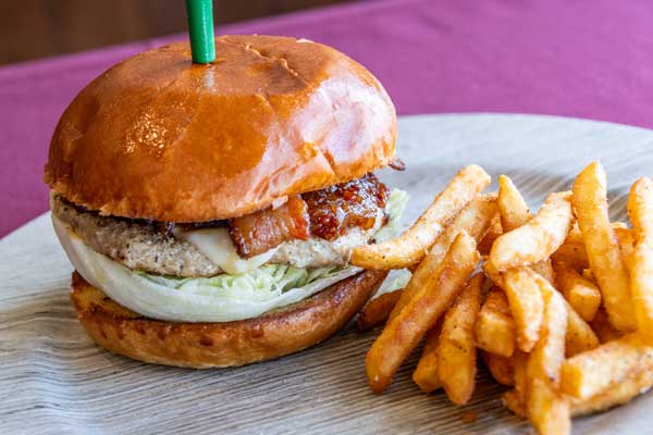 Burger with fries served at MacKenzie’s Sports Bar & Grille at Haggin Oaks Golf Complex in Sacramento