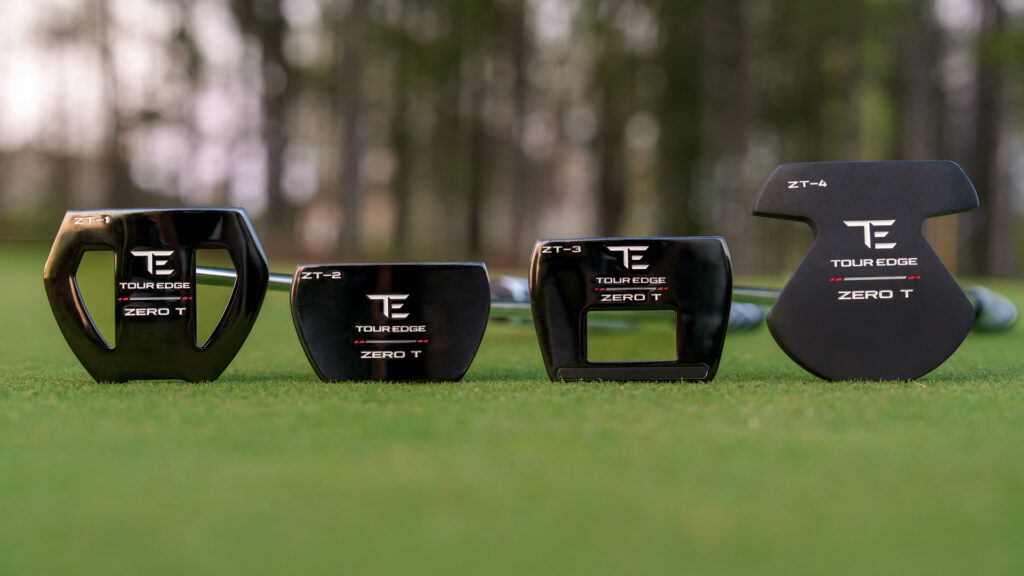 Tour Edge Zero T putter lineup featuring the ZT-1, ZT-2, ZT-3, and ZT-4 putters displayed on a green.