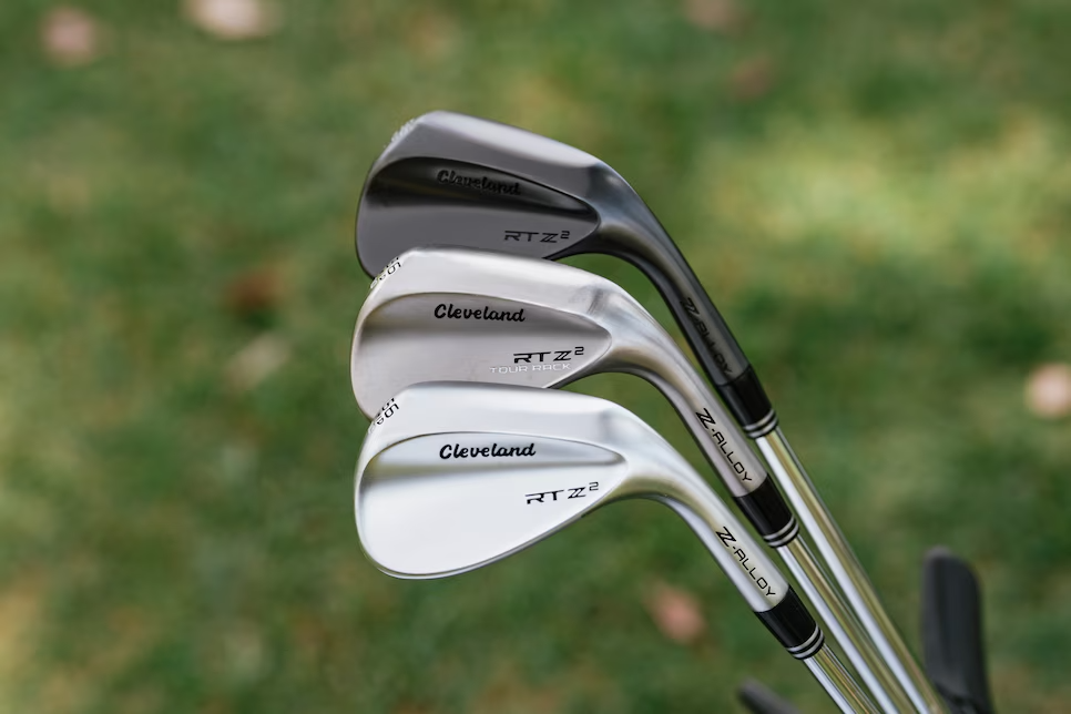 The back of the heads of 3 Cleveland RTZ 2 wedges. They are in 3 different finishes and grinds.